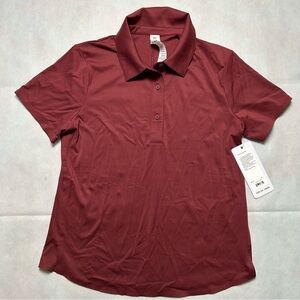 Rhône women’s maroon performance polo size medium NWT
